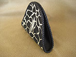 Handmade Giraffe Print Stingray Clutch Bag. 7.5"W X 6.5"H X 1.5"D. w/ Inside Alligator Pocket & Hand-Braided Edge Finish & Magnetic Closure (Side View)