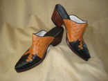 Handmade Cognac Ostrich Mules w/Black Ostrich Fancy Wing-Tip.  Hand Stacked Leather 2.5 Heel w/Dark Finish.